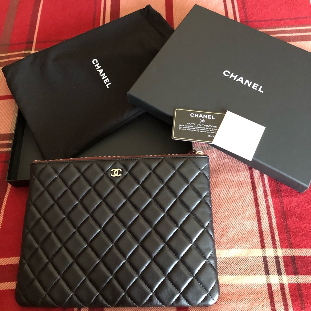 Chanel o case black lambskin